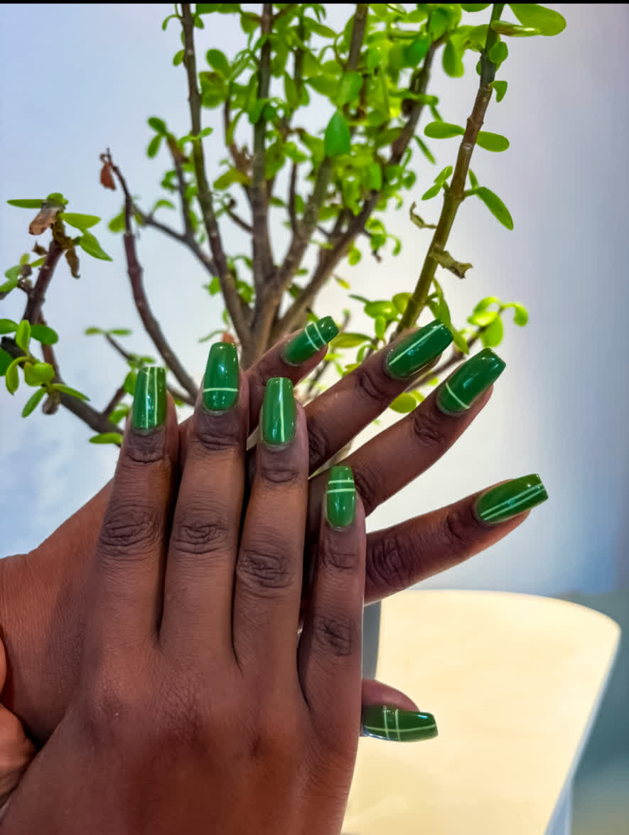 Emerald green gel manicure